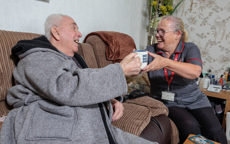 Image shows carer providing home and elderly care to a service user