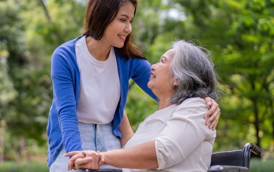 Mother receiving care from her caregiver daughter